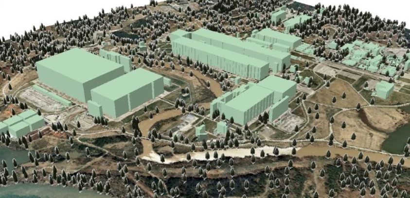 screenshot of a 3D image of a digital elevation model with extruded buildings and vegetation.